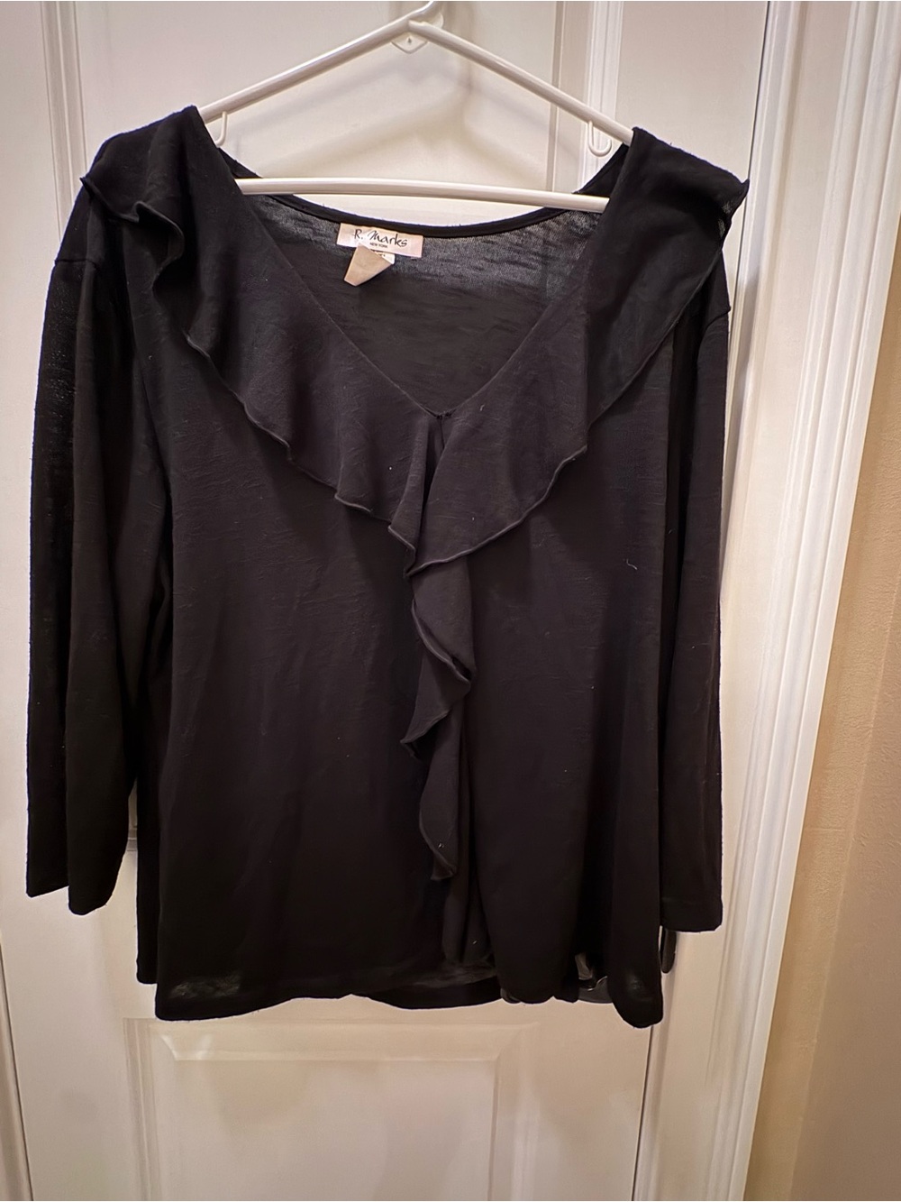 Black Ruffled light weight top. By R marks